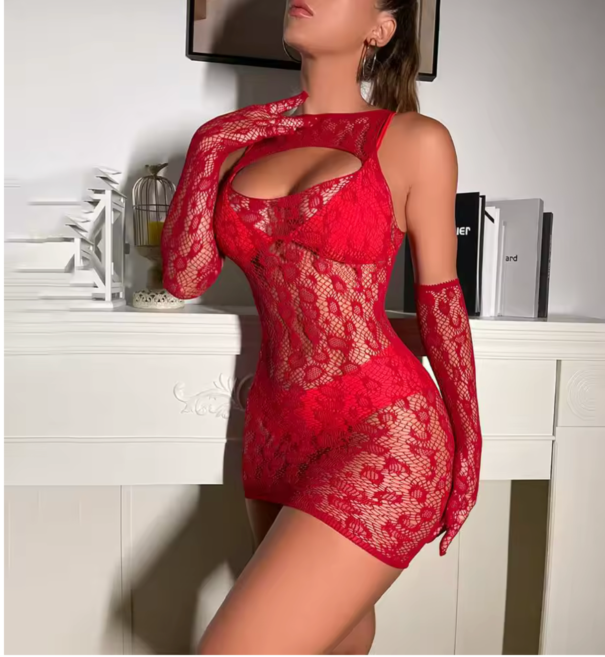 Side view of a woman wearing a red sheer lace lingerie dress with matching lace gloves